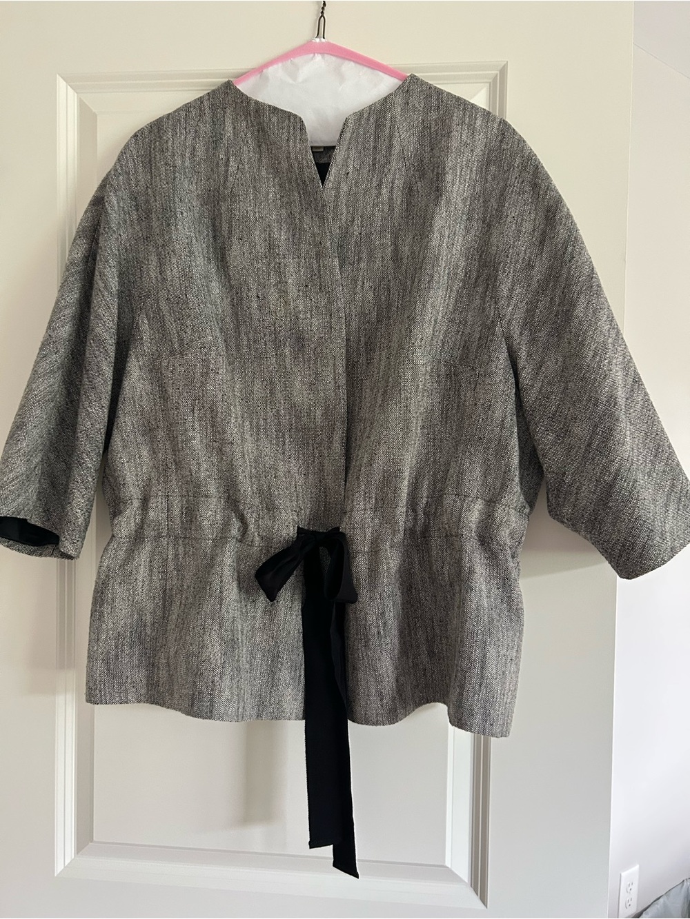 Modern jacket with black ribbon tie